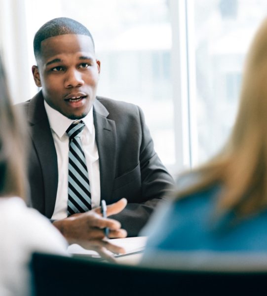 Two women at a meeting with a financial advisor
